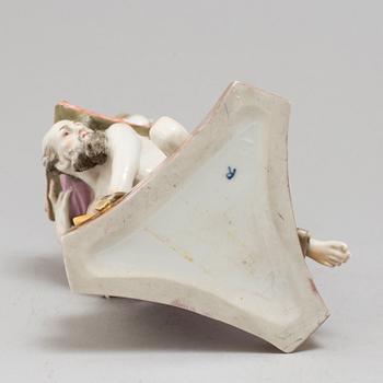 A German porcelain figure, 19th Century. Marked R.