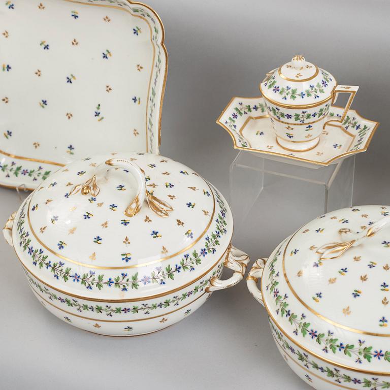 A French dinner service, circa 1800, some pieces marked M F Guerhard & Dahl.  (70 pieces).