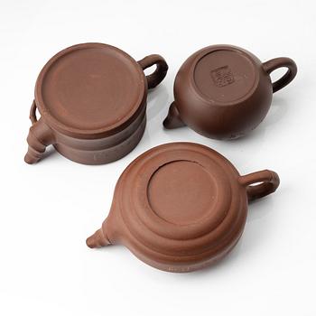 A group of three Chinese yixing teapots, 1960-80s.