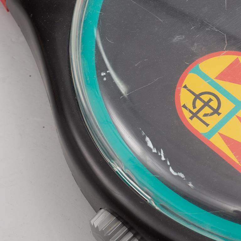 Wall clock, Swatch.