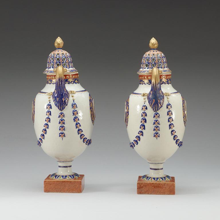 A pair of 'Marieberg shaped' jars with covers, Qing dynasty, Jiaqing (1796-1820).