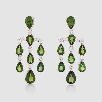 1398. A pair of green tourmaline and brilliant-cut diamond earrings.
