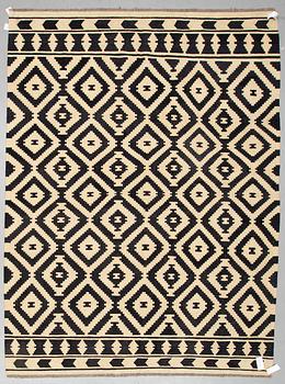 A CARPET, kilim, ca 292 x 217 cm.