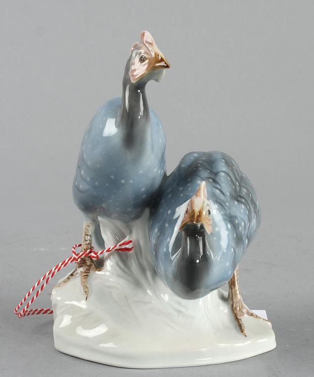 FIGURIN, porslin. Rörstrand, sign Lindström.