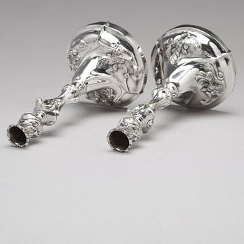 A pair of Swedish 18th century rococo silver candlesticks, mark of Jacob Lampa, Stockholm 1772.