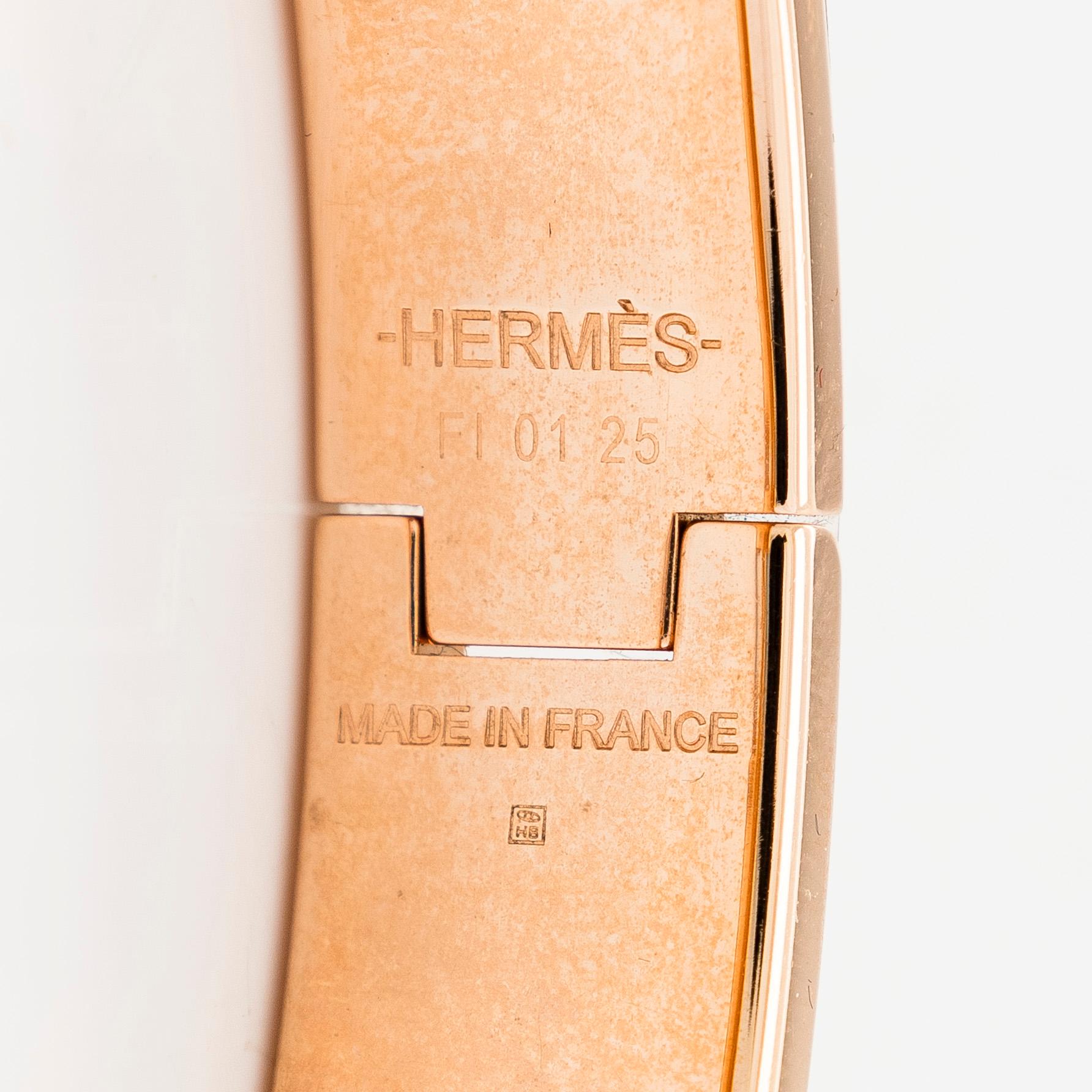 Hermès, a 'Clic H' bracelet.