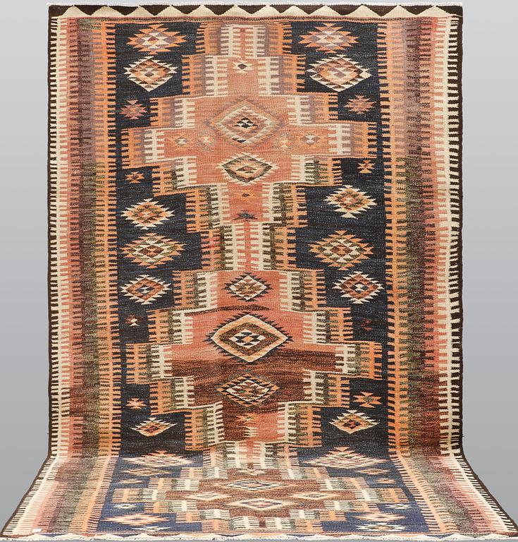 A kurdish kilim carpet, 310 x 190 cm.