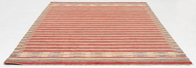 A flat weave carpet, c. 256 x 158 cm.