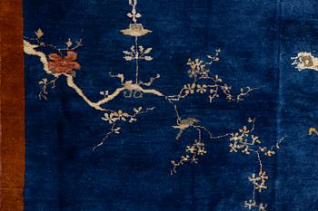 A Chinese art deco carpet, c. 327 x 278 cm.