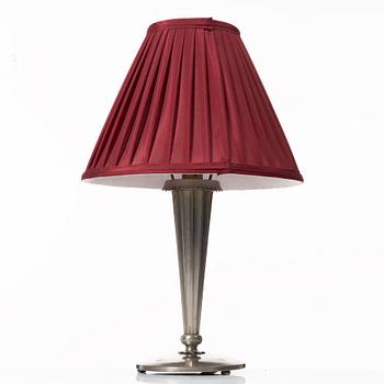 Harald Notini, a Swedish Grace table lamp model "6913", Arvid Böhlmarks Lampfabrik, Stockholm, 1920s.