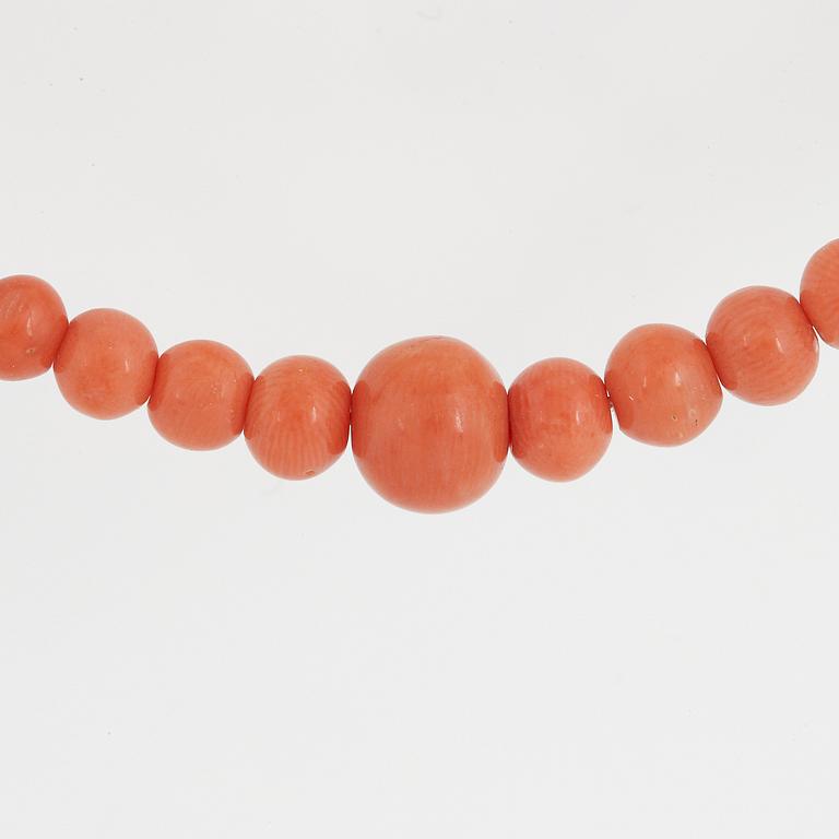 Coral bead necklace.