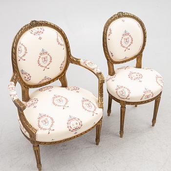 A Gustavian style sofa with two armchairs and two chairs, 20th century.