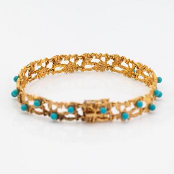 A 14K gold braclelet with turquoise imitation. H.Lahtinen&Co, Helsinki 1970.