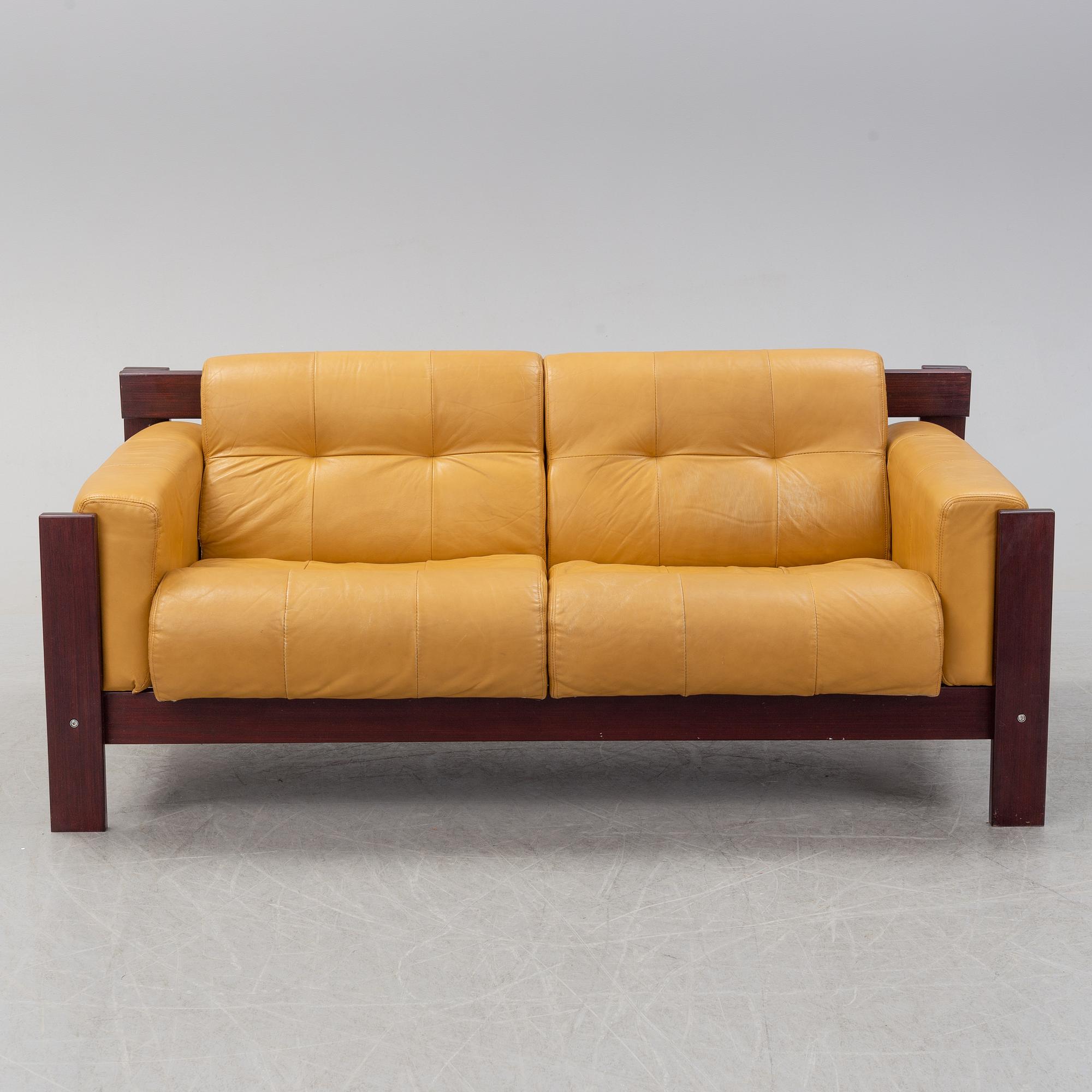 A set of two leather sofas with an easy chair from  Percival Lafer,  Lafer SA, late 20th century.