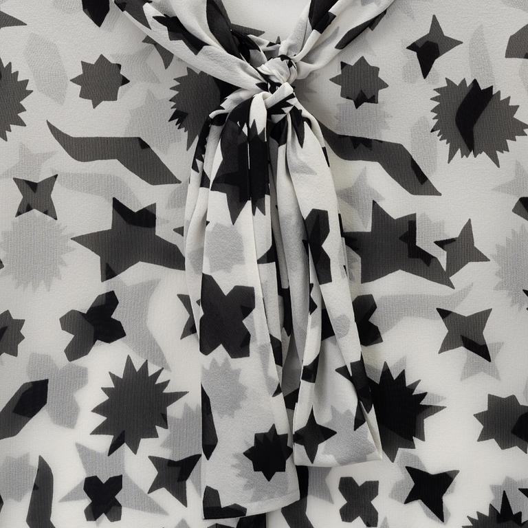 Yves Saint Laurent, a silk blouse, size 36.