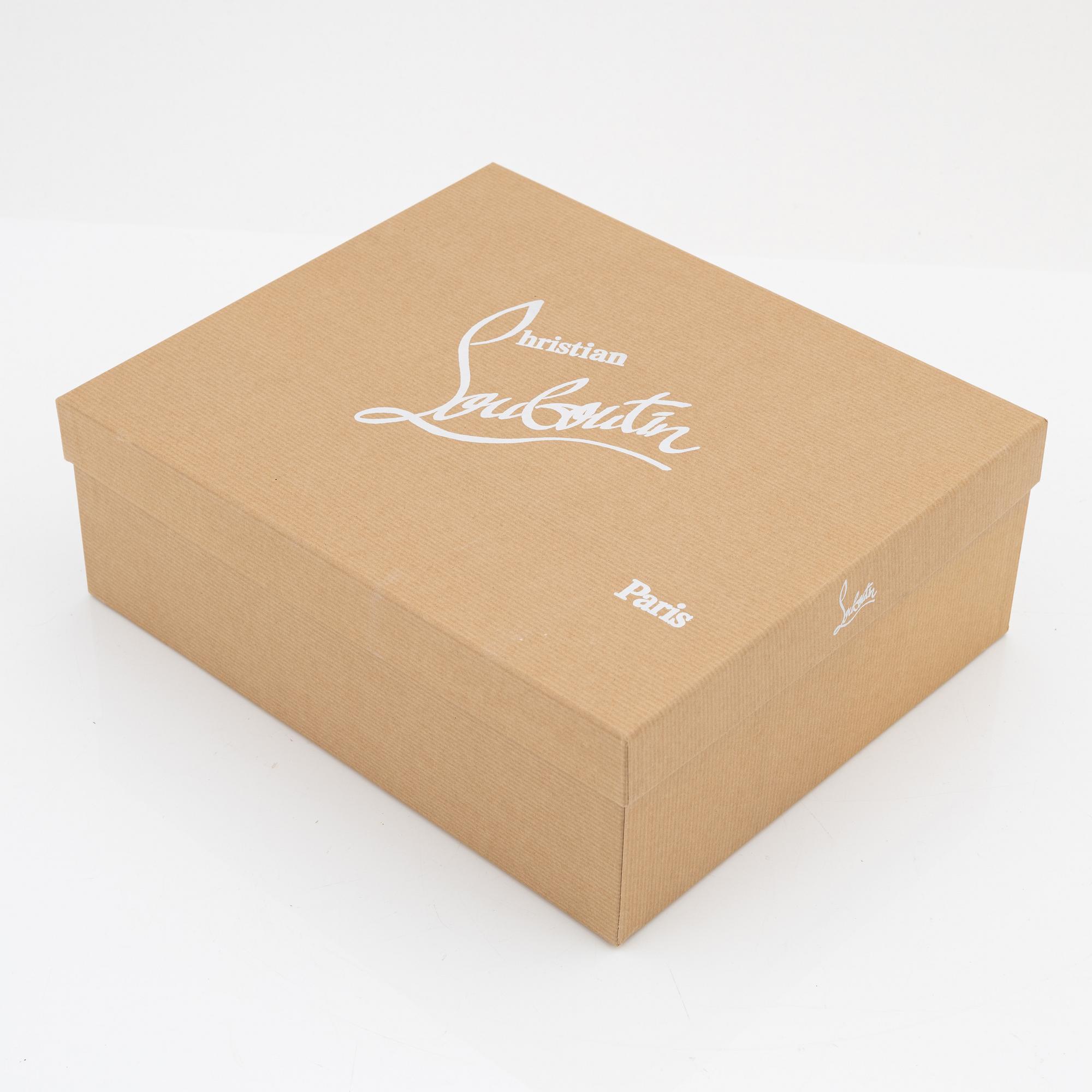 Christian Louboutin, a pair of beige leather sandals, size 37.