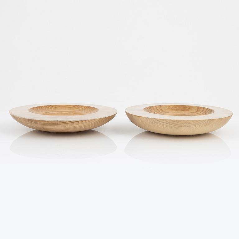 Magnus Ek, a set of four ash wood plates for Oaxen Krog, 2020.