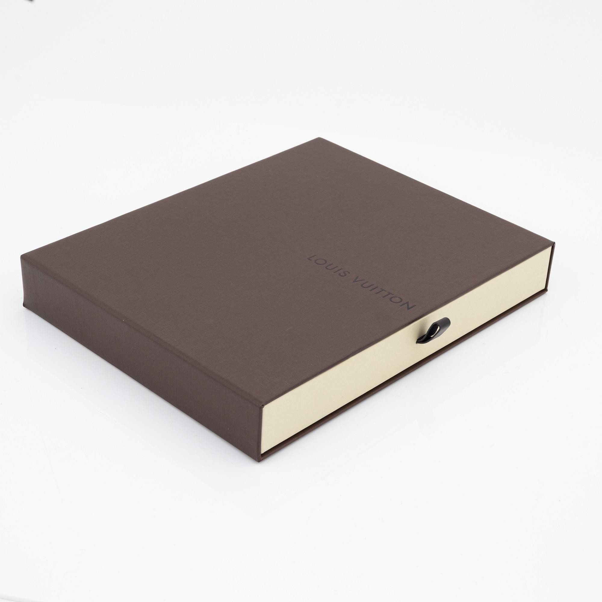 Louis Vuitton, a monogram ipad case, 2012.