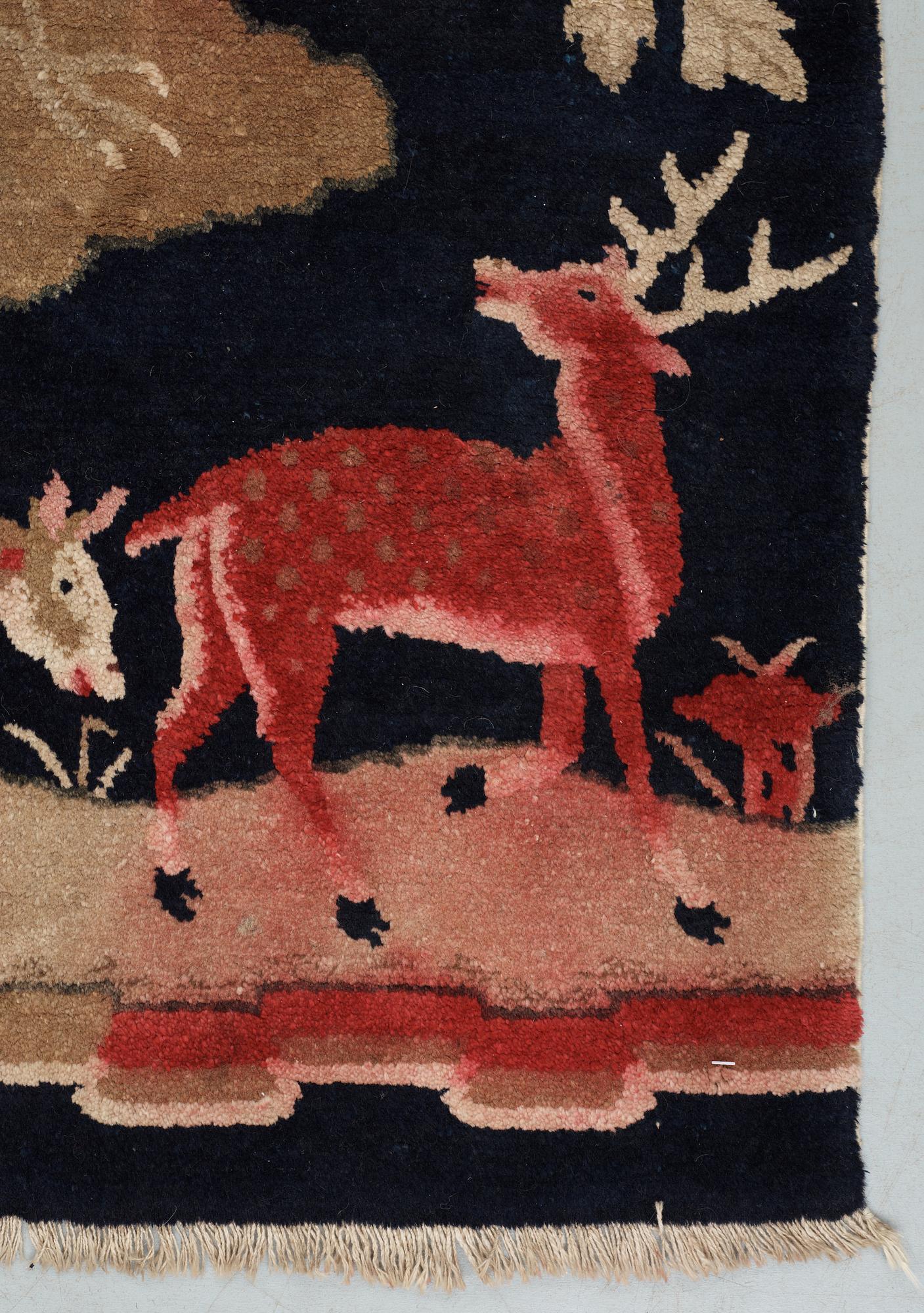 A semi-antique Baotou figural so called Wedding Rug.