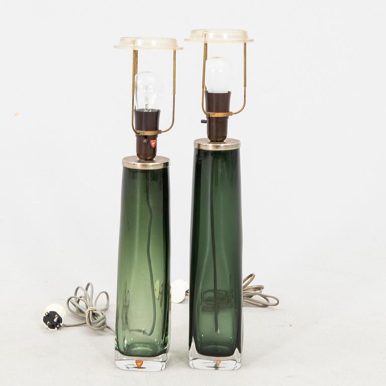 Carl Fagerlund, a pair of glass table lamps from orrefors model no RD 1480.