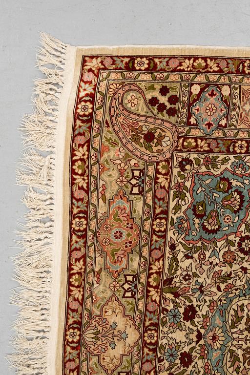 A rug, Old silk Hereke, ca 152 x 110 cm.