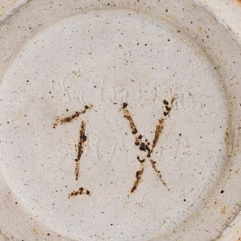 Michael Schilkin, a stoneware bowl, signed Schilkin Arabia.