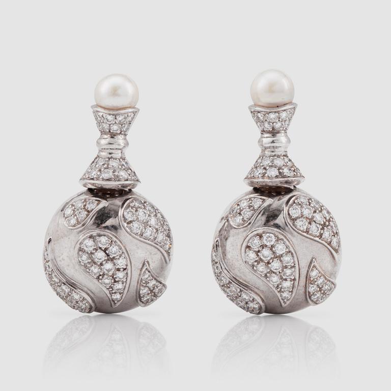 A pair of diamond and cultured pearl earrings. Total carat weight of diamonds circa 2.50 cts.