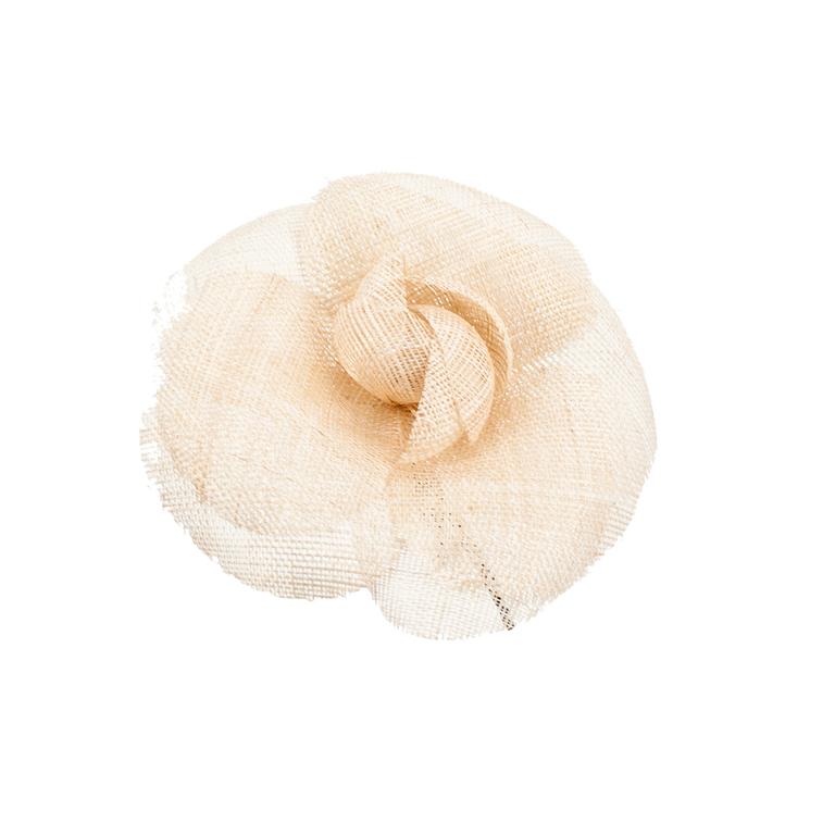 CHANEL a beige linnen camelia flower.