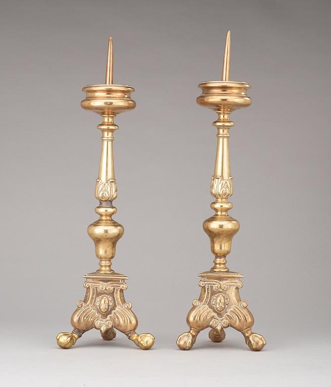 A pair of probably Flemish 17th century brass pricket candlesticks.