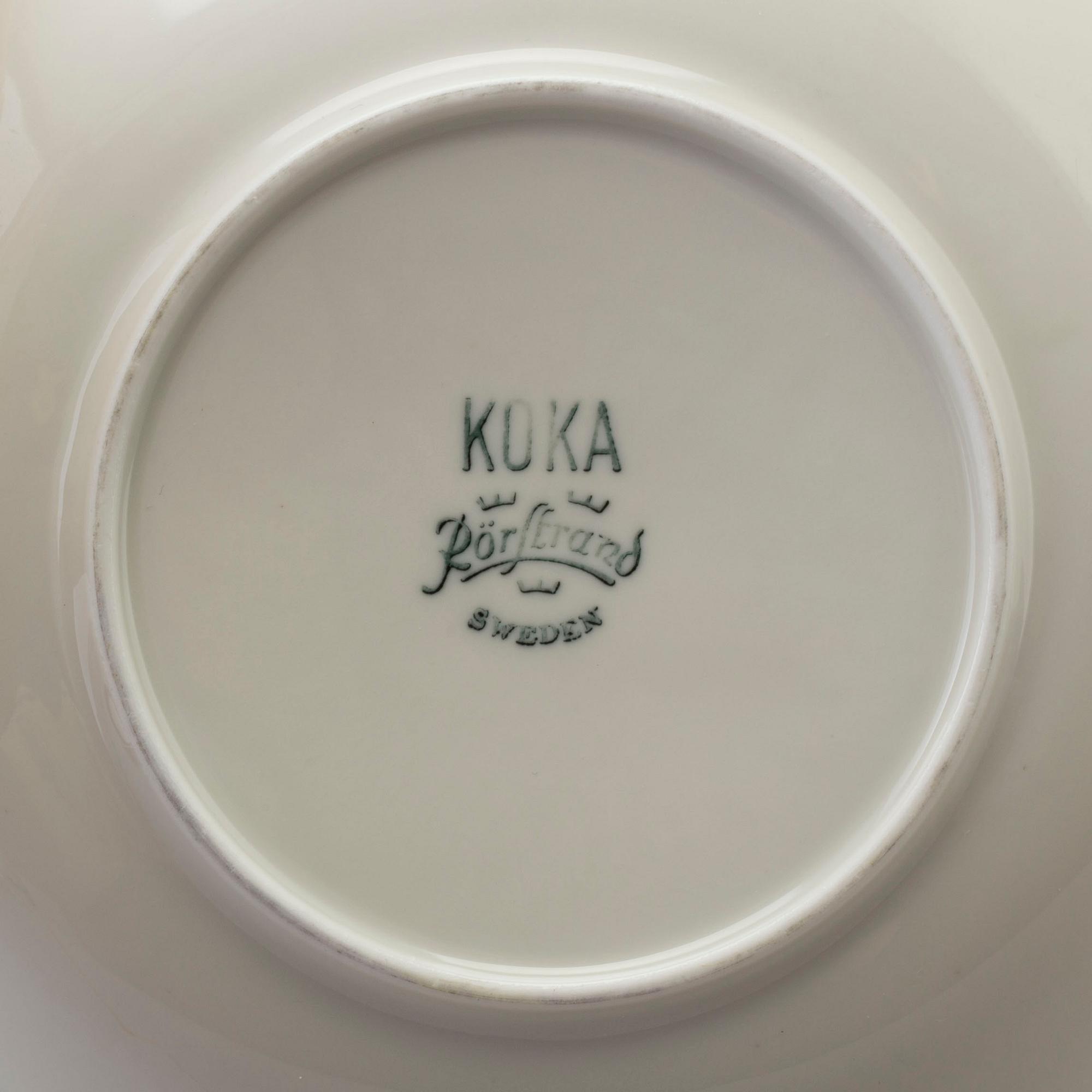 a 51 pcs porcelin dinner service, 'Koka blå', by Hertha Bengtsson, Rörstrand, in production 1956-1988.
