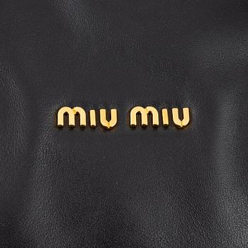 Miu Miu, a black leather handbag.