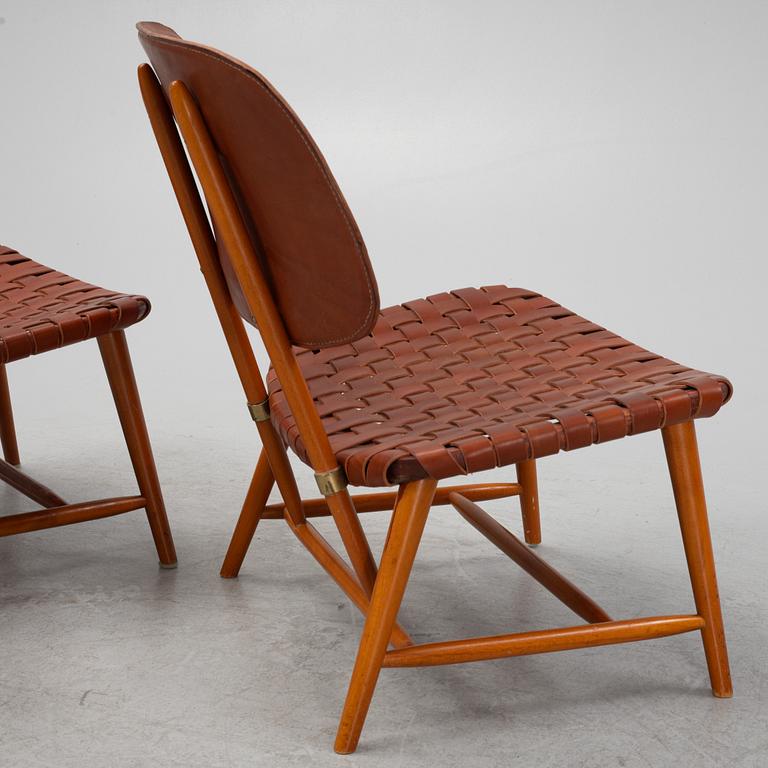 Alf Svensson, a pair of 'TeVe' easy chairs with new leather upholstery, 1950s.