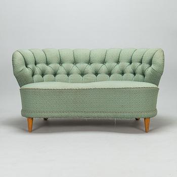 A mid-20th-century sofa.