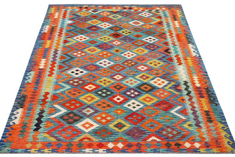 A Kilim carpet, c. 297 x 197 cm.