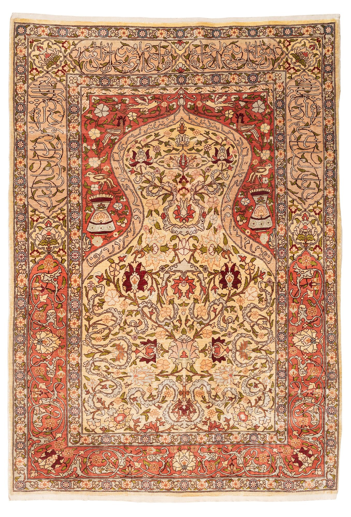 A silk Hereke, rug, ca 103 x 73 cm.