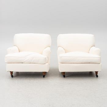 Vico Magistretti, a pair of 'Raffles' armchairs, De Padova, Italy, 21st century.