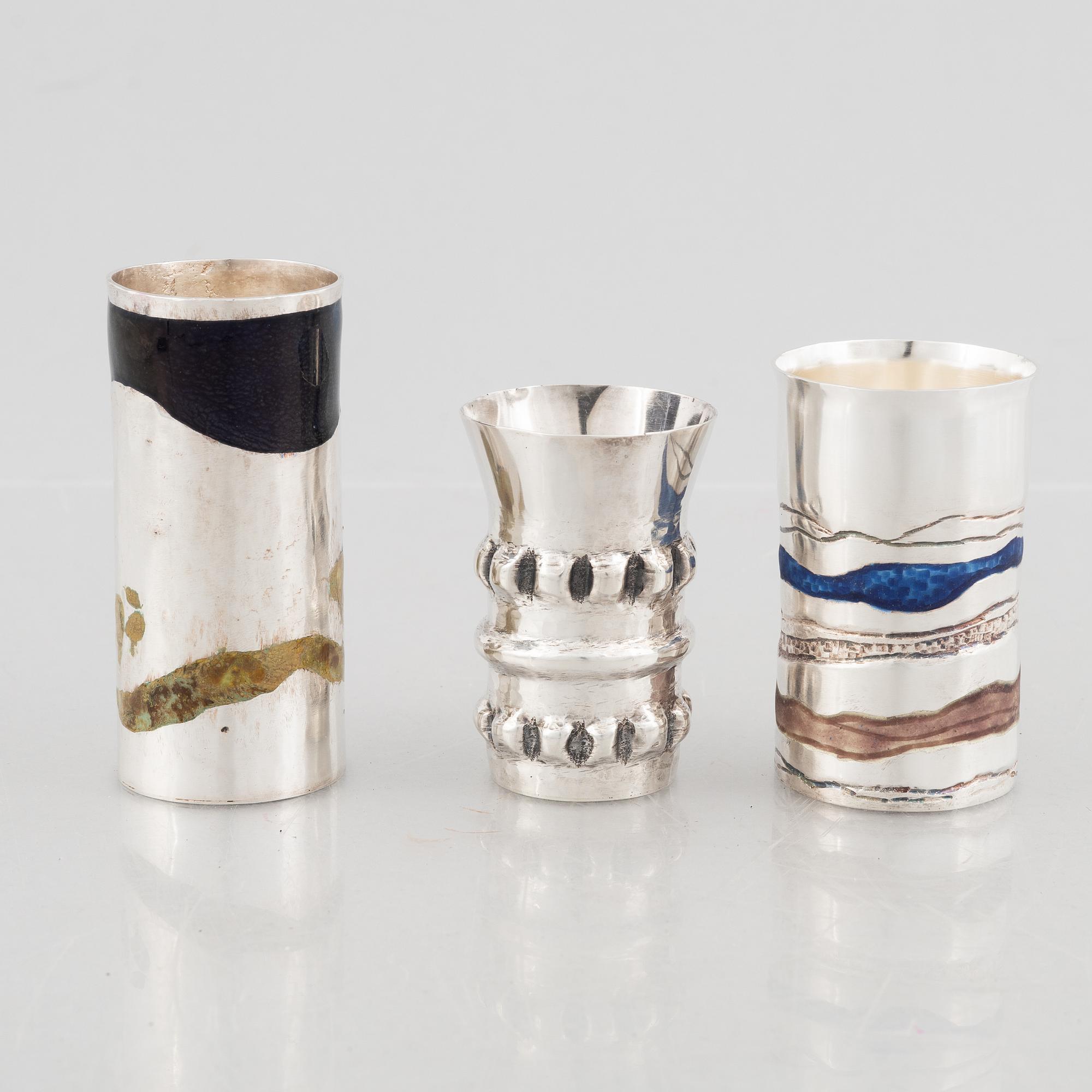 Three sterling silver miniature beakers/vases, marks of Lars Arby, Gothenburg, Sweden 1977-1982.