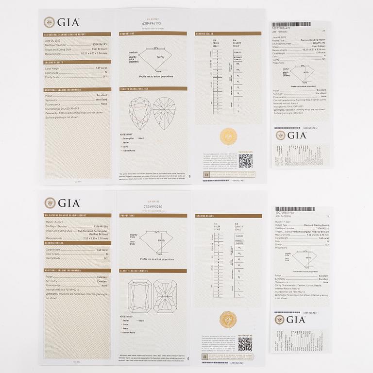 Crossover ring, 18K white gold set with pear-shaped and emerald-cut diamonds. Accompanied by GIA report.