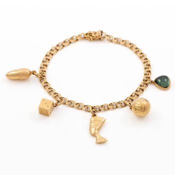Bracelet 18K gold with five charms.