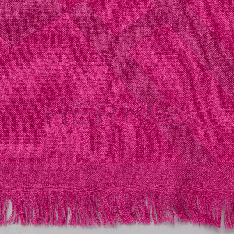 A cashmere and silk shawl by Hermès.