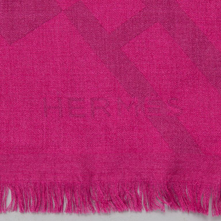 A cashmere and silk shawl by Hermès.