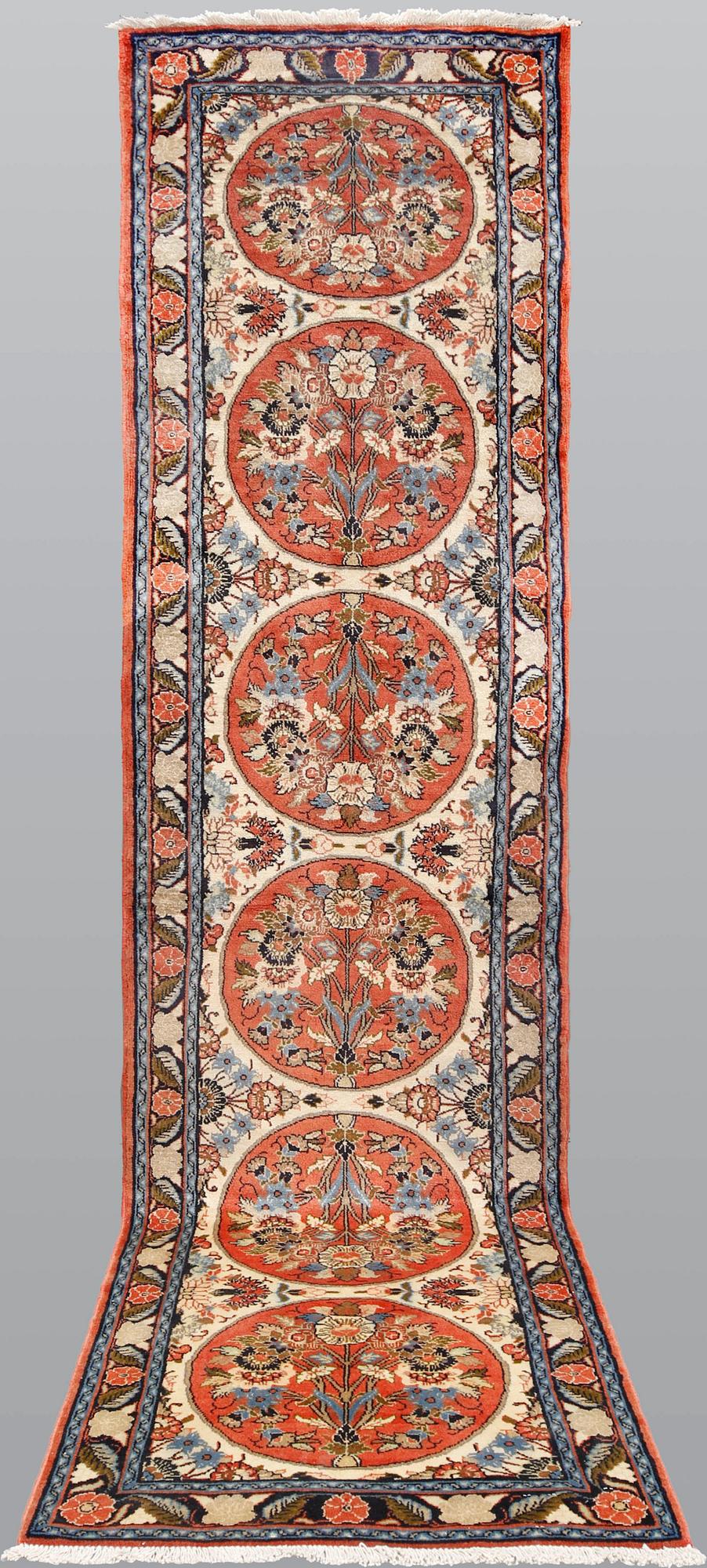 A Hamadan runner, ca 310 x 81 cm.