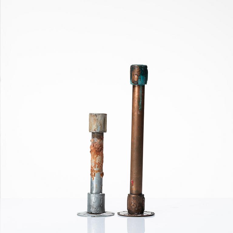 Two 20th century industrial design metal/copper pipe candlesticks.