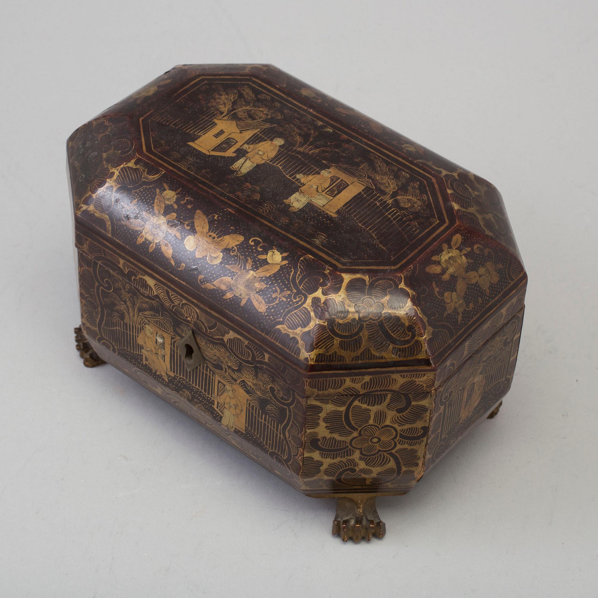 A Chinese Export Lacquerware Tea Caddy with Pewter Fitted Interior, 19th Century.