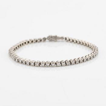 Tennis bracelet, 18K white gold and brilliant-cut diamonds.