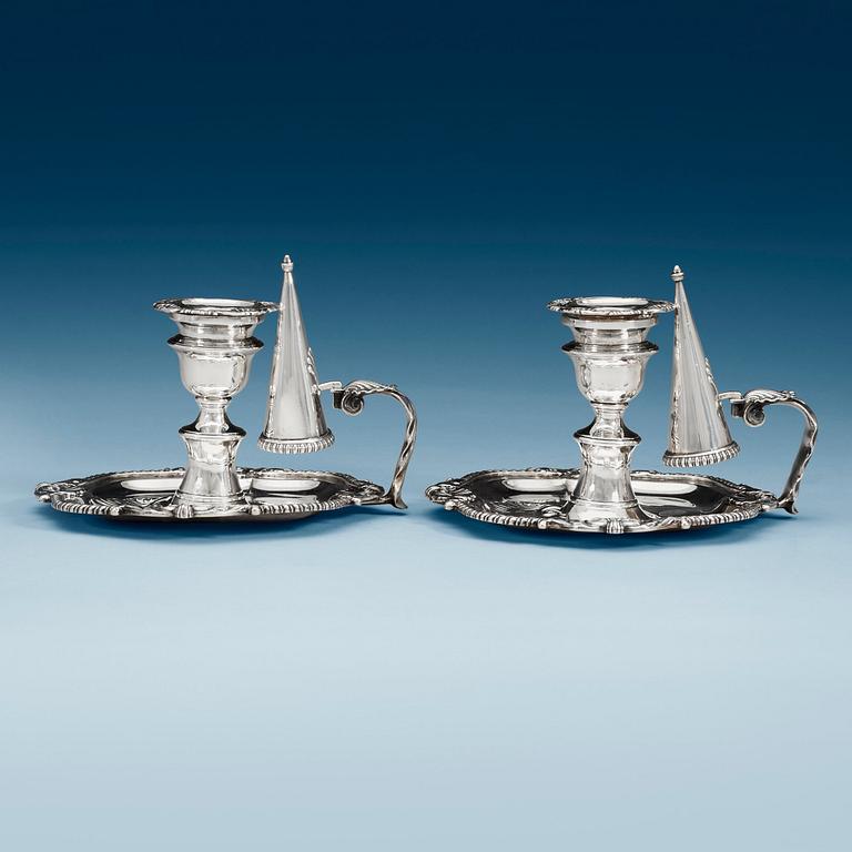 A pair of English 19th century silver chamber-candlesticks, marks of Benjamin Smith II and James Smith III, London 1808.