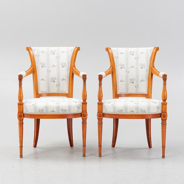 A pair of Louis XVI-style open armchairs, 20th century.