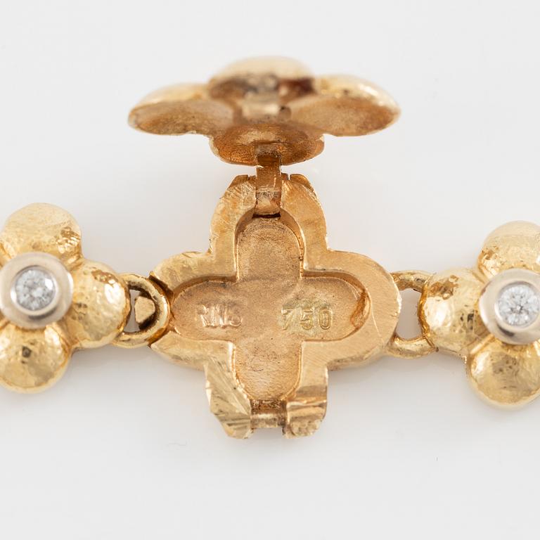 Armband, 18K guld med briljantslipade diamanter.