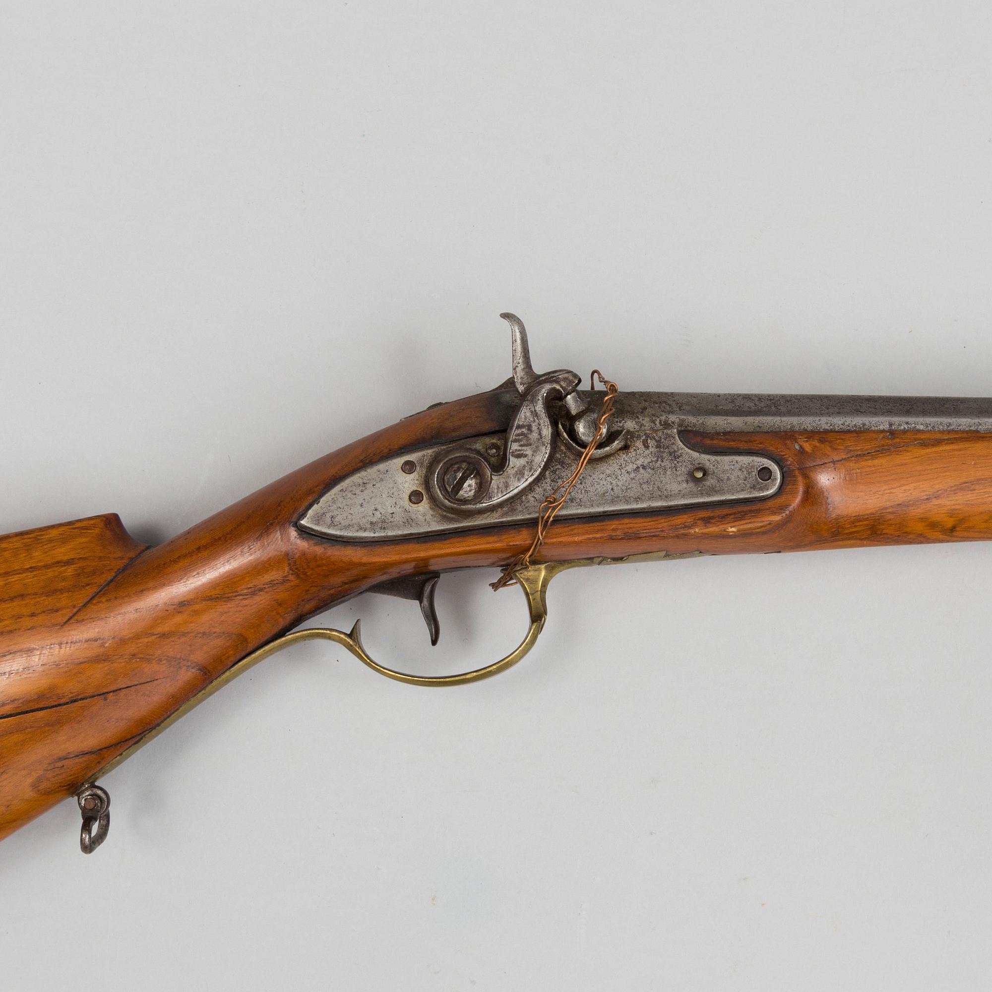 An 18th century percussion gun.