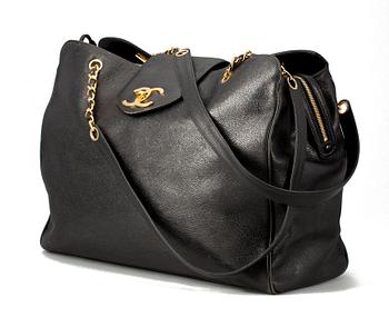 304. A 1990s black "caviar" leather bag by Chanel.